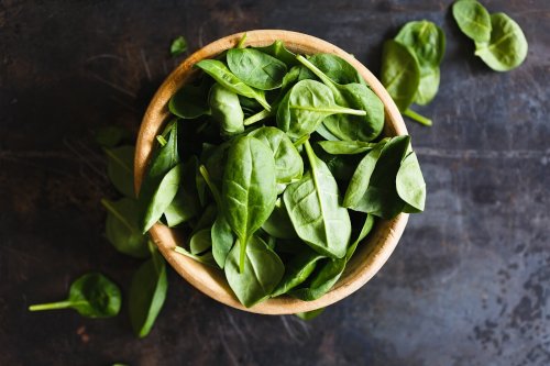 Fresh basil leaves in a bowl